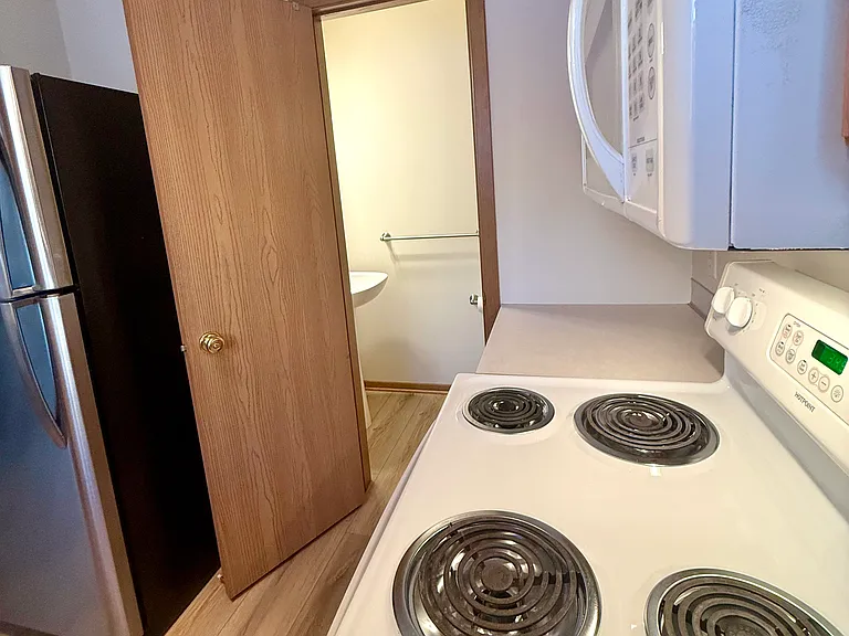 Kitchen - shows entry to half bath