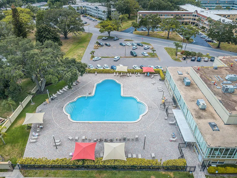 Main clubhouse with main pool short 5-10 min walk from condo