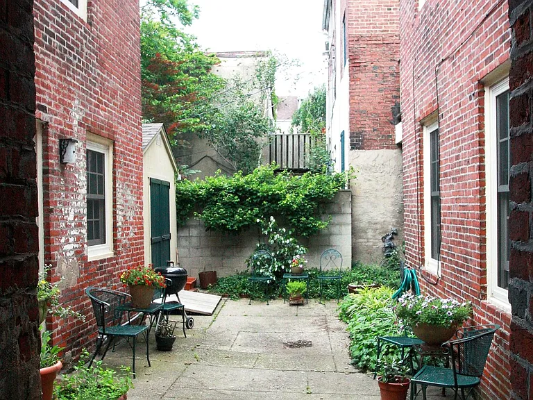 Common Courtyard with Garden, Bike Storage & Trash Room