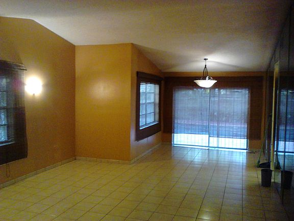 Great room has cathedral ceilings