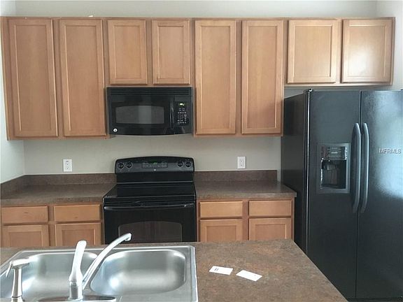 4th image of 14108 Avenue Of The Grvs #0