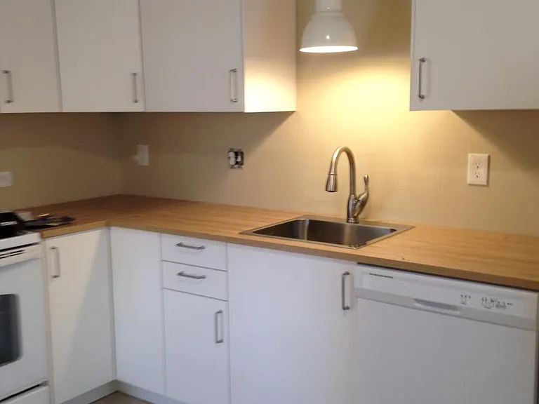 Lower corner cabinet has a lazy susan.