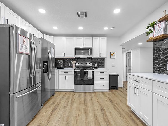 Large beautiful kitchen with two refrigerators