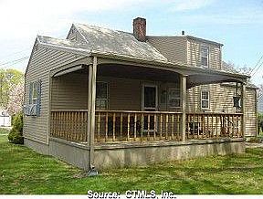 Rear of home.  Nice covered porch with beadboard ceiling.