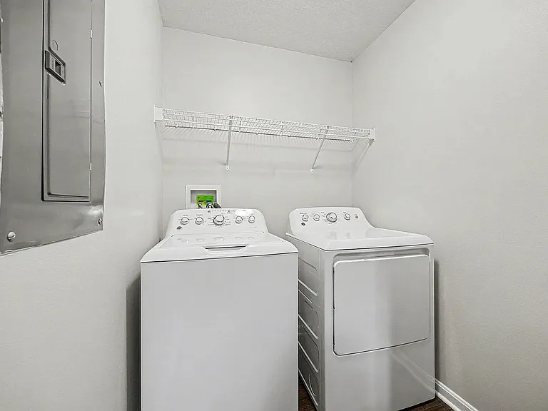 Includes a dedicated laundry room with new full-size washer and dryer.