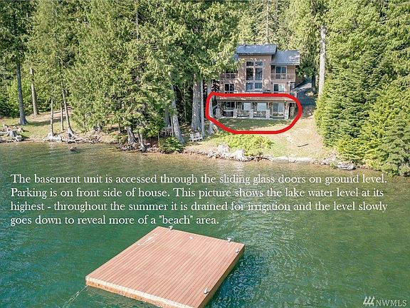 view from lake. Ground floor apartment with direct access to yard and lake