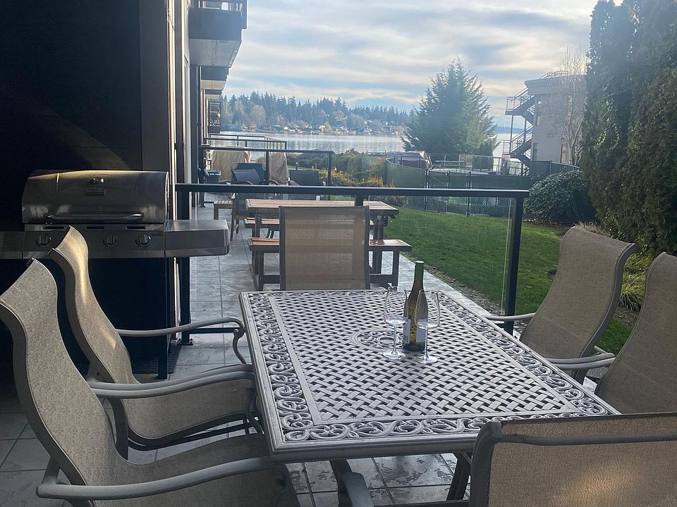 Patio with Grill, Wooded View, Lake View. Please note BBQ grill is no longer on the property - Gas hookup is available.