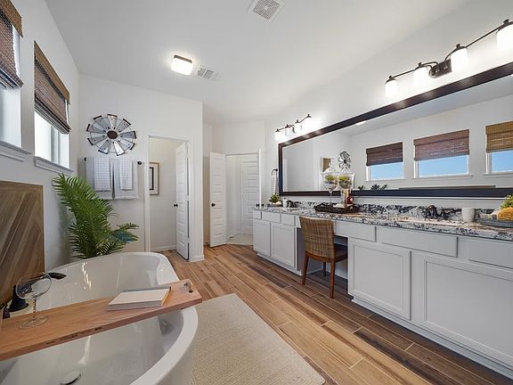 Primary luxury bath with freestanding tub