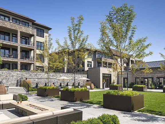 St. Regis Residences Rye_Ext Courtyard Firepit Day_Copyright Andrew Rugge Courtesy Perkins Eastman.jpg