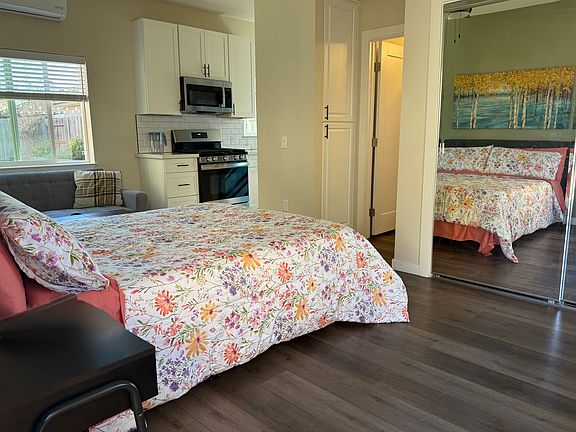 Interior - Queen bed with premium quality memory foam mattress.