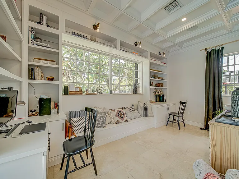 Under window banquette has built-in storage.