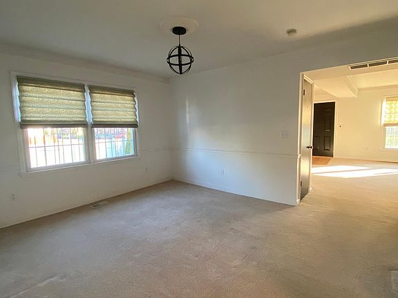 Dining Room looking into the Living Room (freshly painted)