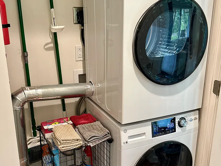 Brand new GE washer/dryer - summer 2024 - and plenty of cleaning supplies.