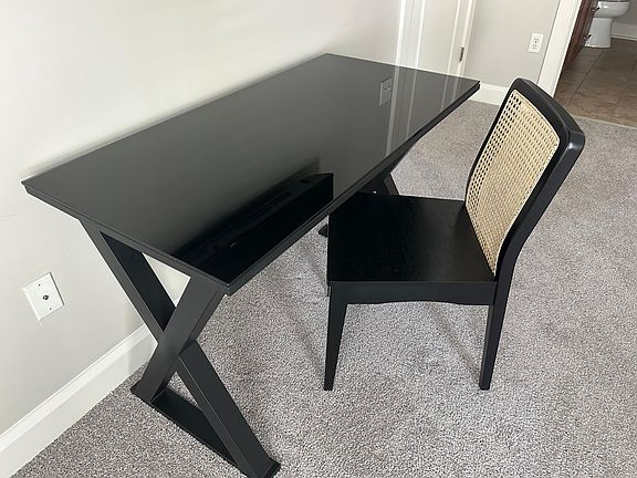 Primary bedroom has a desk