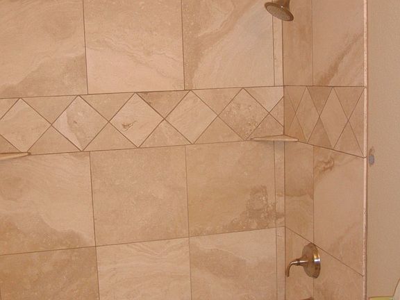 Guest Bath: Travertine Floor to Ceiling Brushed Nickel Kohler Forte Fixtures.