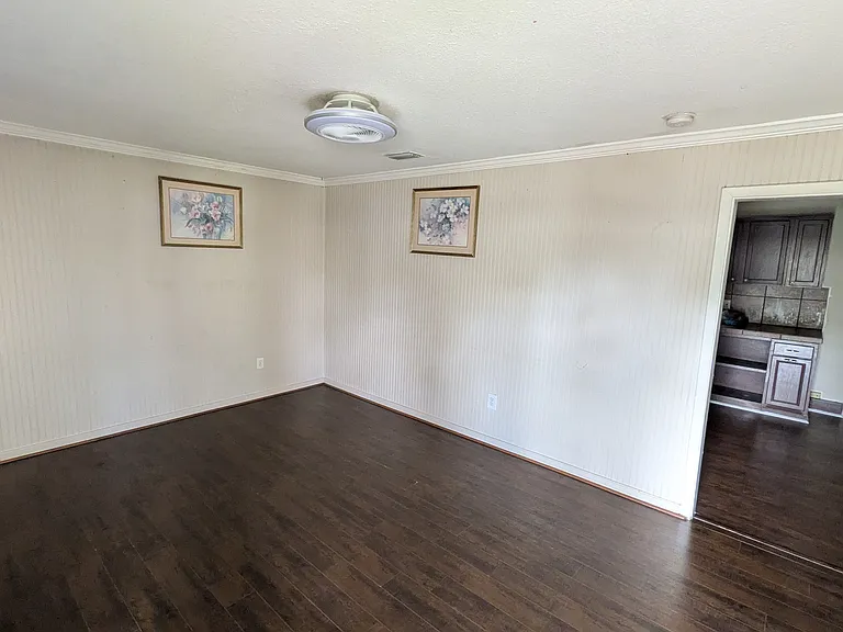 Living room opening to kitchen