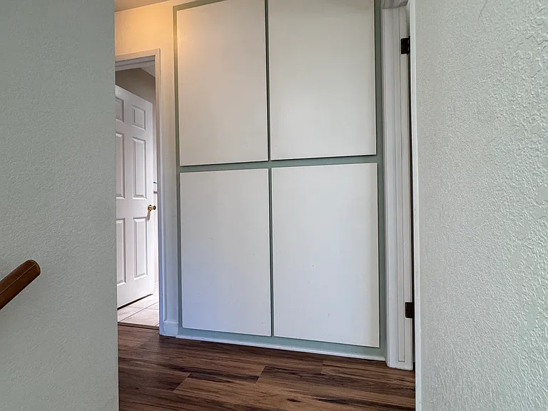 Large storage cabinets in upstairs hallway.