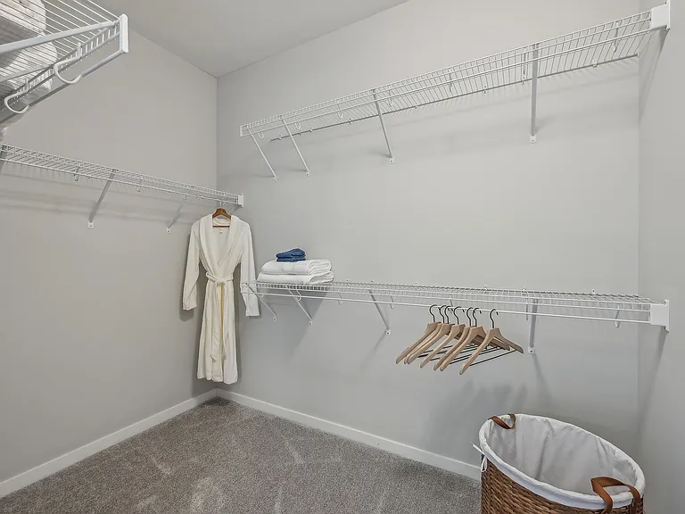 SMC_2Bed_PrimaryBed_WalkInCloset1