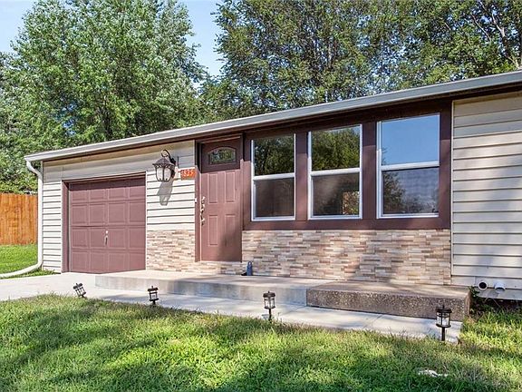 Lovely front porch and stone work.