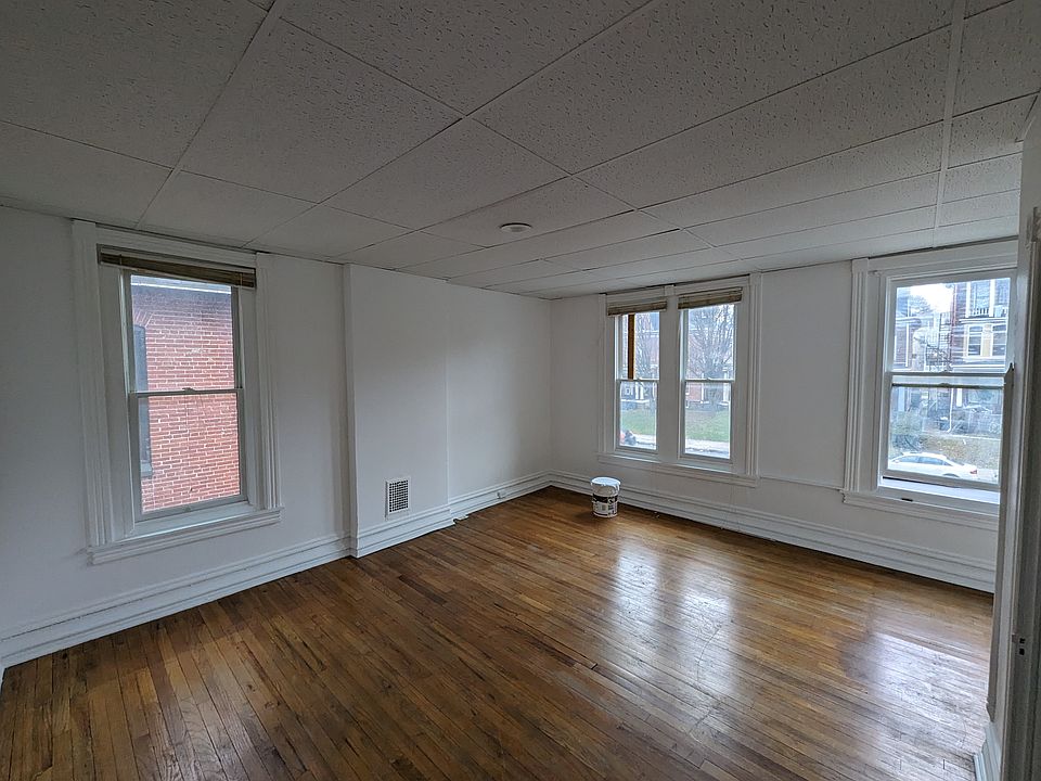 Bedroom is street facing with 4 windows and 1 closet