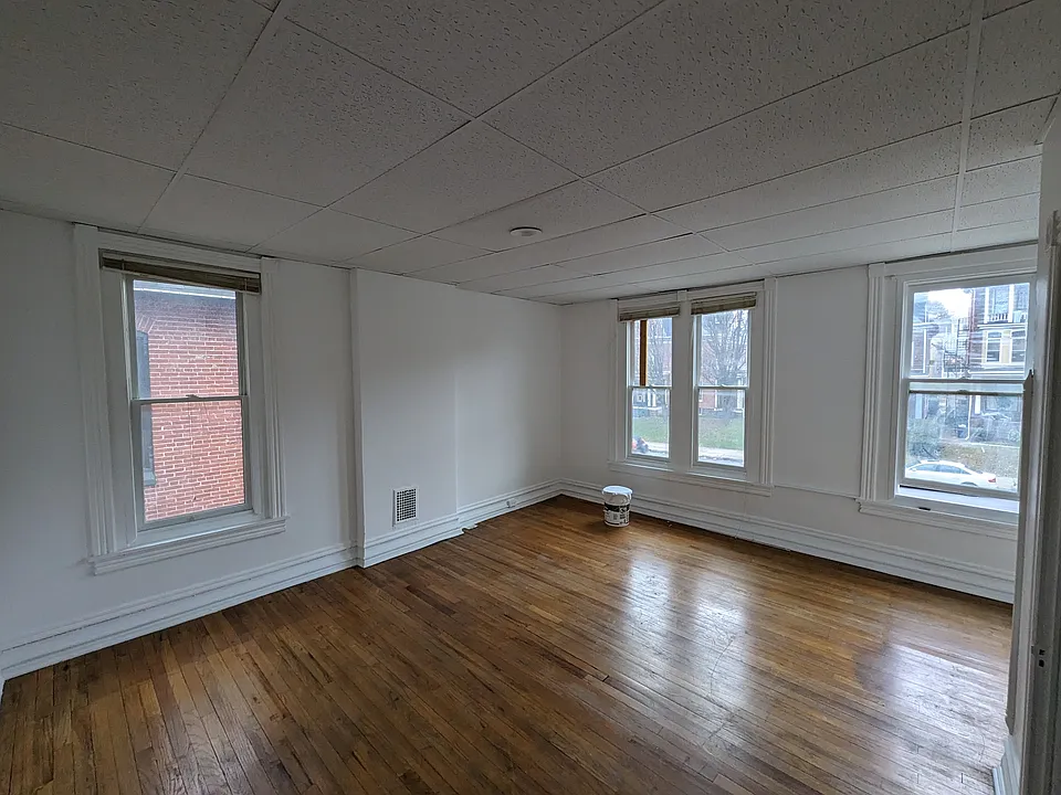 Bedroom is street facing with 4 windows and 1 closet