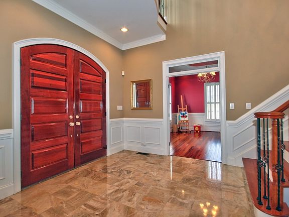 Foyer features Marble Floors