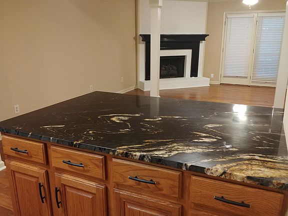 Kitchen open to living room and Gas Fireplace