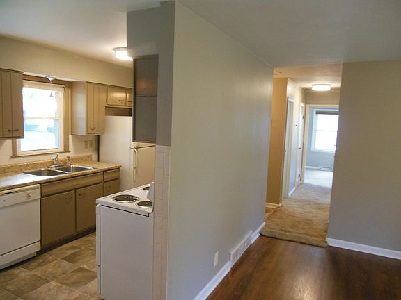 Open kitchen design that opens up into living room