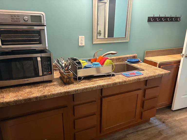 bathroom with small cooking area