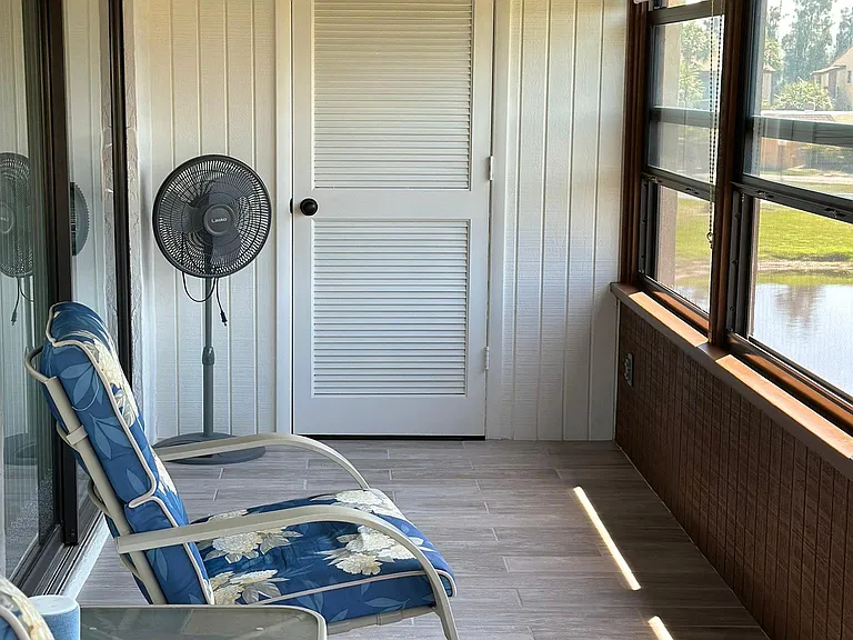 screened in lanai- has over head fan and lights
