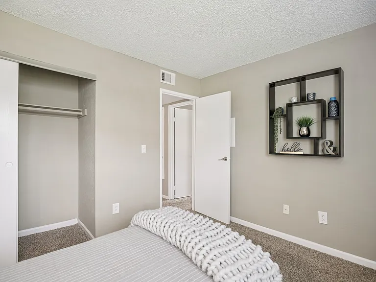 Secondary bedroom with closet.