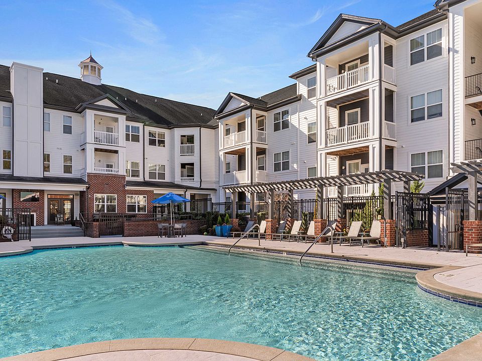 Soak in the sun at our expansive saltwater swimming pool with outdoor TV and cabana