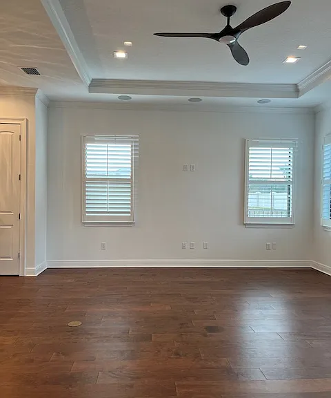 Living Room Hardwood Floors, Plantation Shutters, Fan