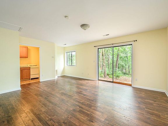 Open space here big enough to fit a queen bed, couch and media center, and dining nook set. Washer Dryer to be installed soon into this back corner!