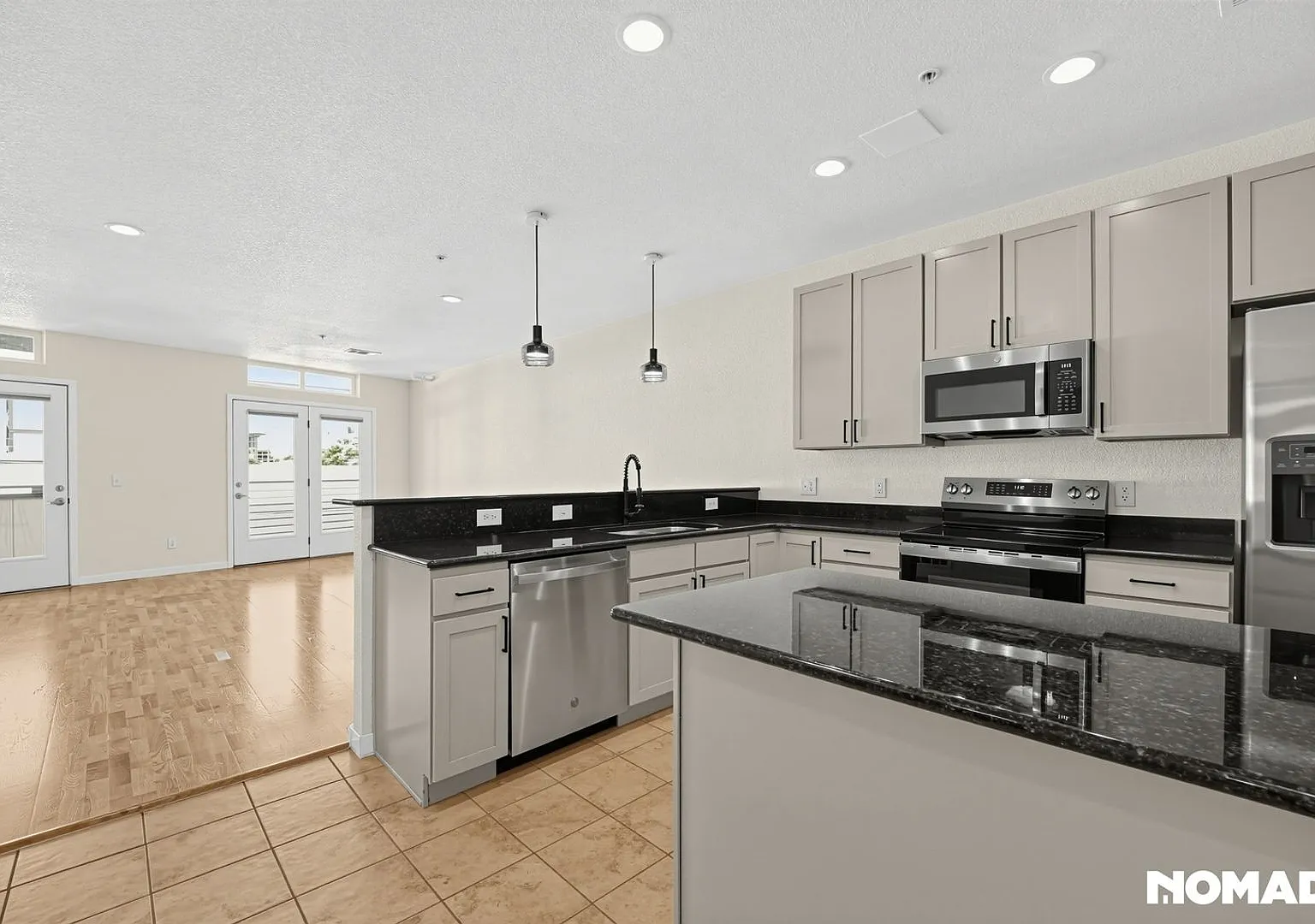 Elevated RiNo Living | 2BR + 2.5BA | Private Patios | Parking — Photo 4