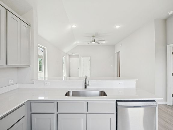 Kitchen in the Pine home plan by Trophy Signature Homes - REPRESENTATIVE PHOTO