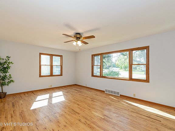 Large, light filled living room has plenty of wall space for all your furniture with room to still m