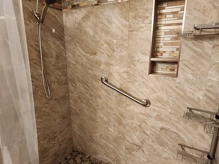 Two bathrooms with walk-in showers.