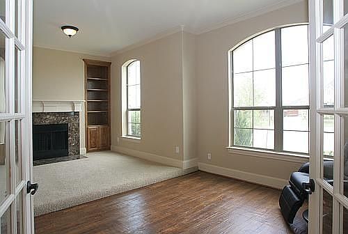 Office with Fireplace, built ins and scraped hardwod flooring