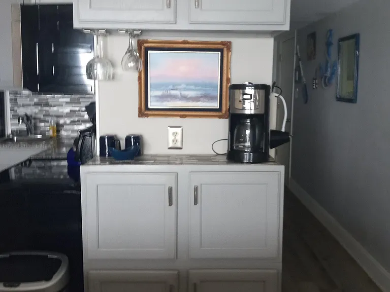 The coffee bar also has wine glasses for evening drinks.