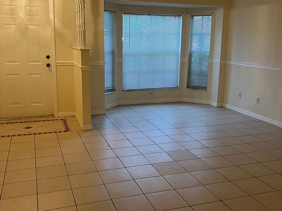 Spacious open living room with decorative chair rail