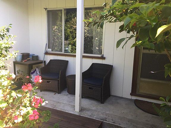 Private cool porch with flower garden