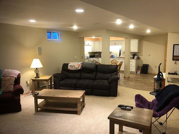 View of "open concept" living room and kitchen/dining area. Two daylight windows are in this space