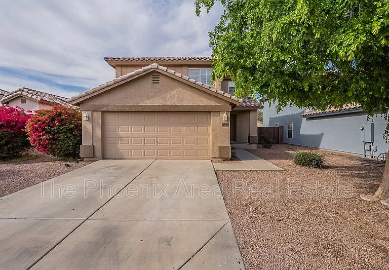 11928 W Columbine Dr — Photo 2