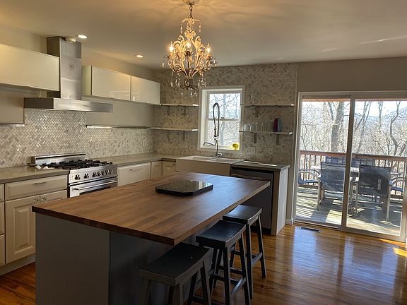 Butcher block counter island in kitchen.jpg