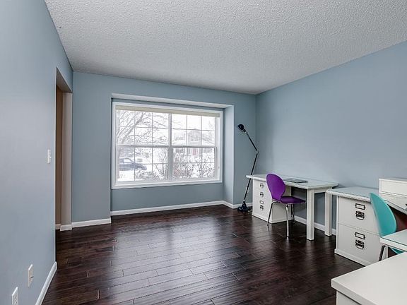 Spacious and bright flex room just off of the entry could be used as an office, additional seating area or would be a great toy room.