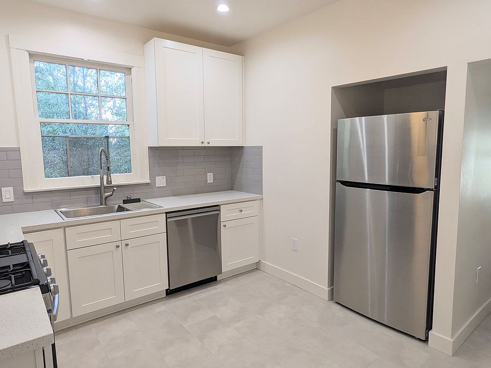 Brand new remodeled kitchen with new appliances, including dishwasher