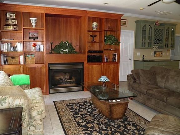 Cherry built in with gas fireplace and room for a large screen tv 