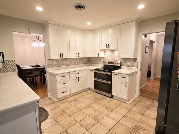 Kitchen with range hood venting out