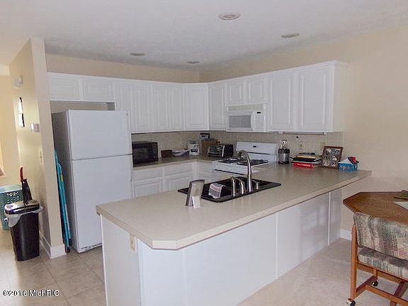 4th image of 8452 N Center Park Dr SW #12